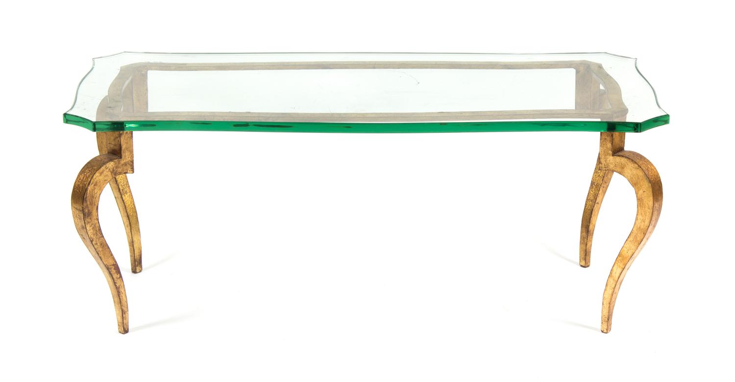 A Gilt Metal and Glass Low Table Height 17 x width 41 7/8 x depth 20 1/4 inches.