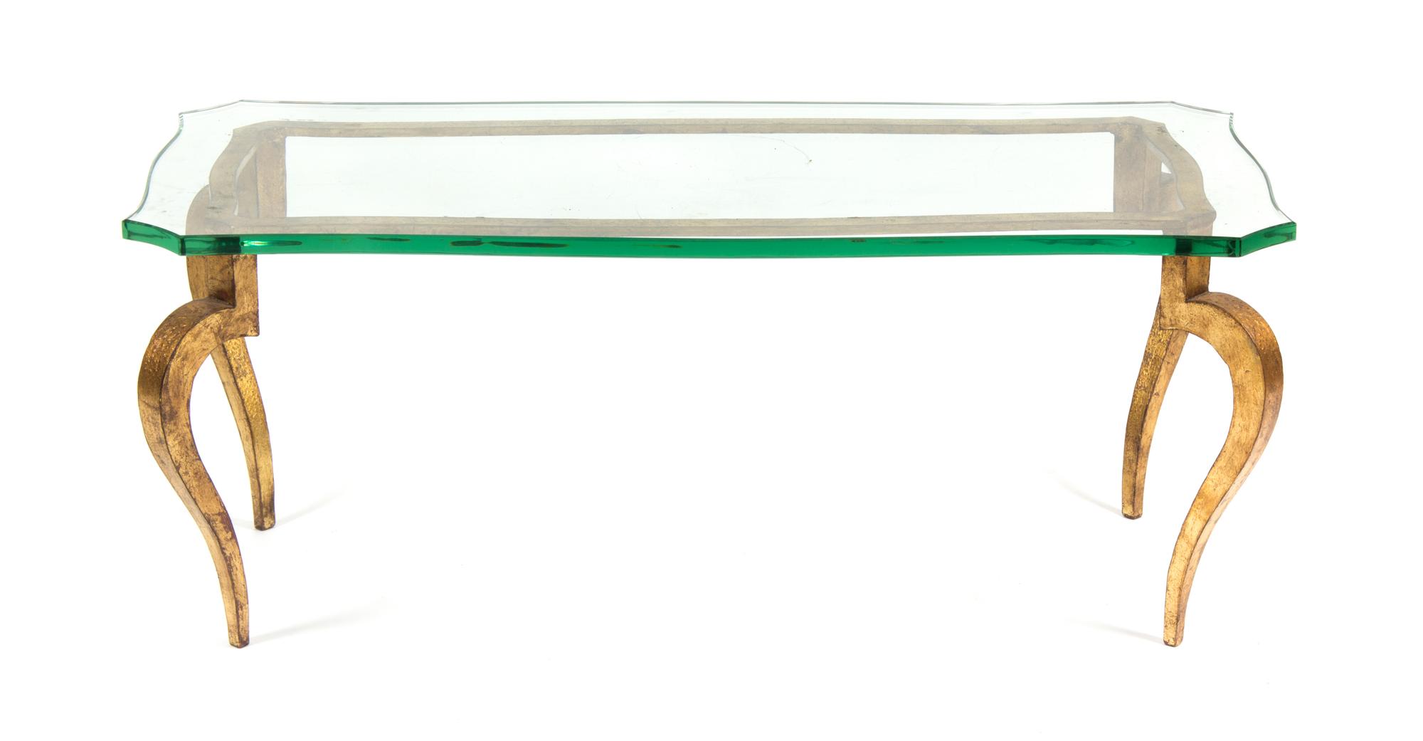 A Gilt Metal and Glass Low Table Height 17 x width 41 7/8 x depth 20 1/4 inches.