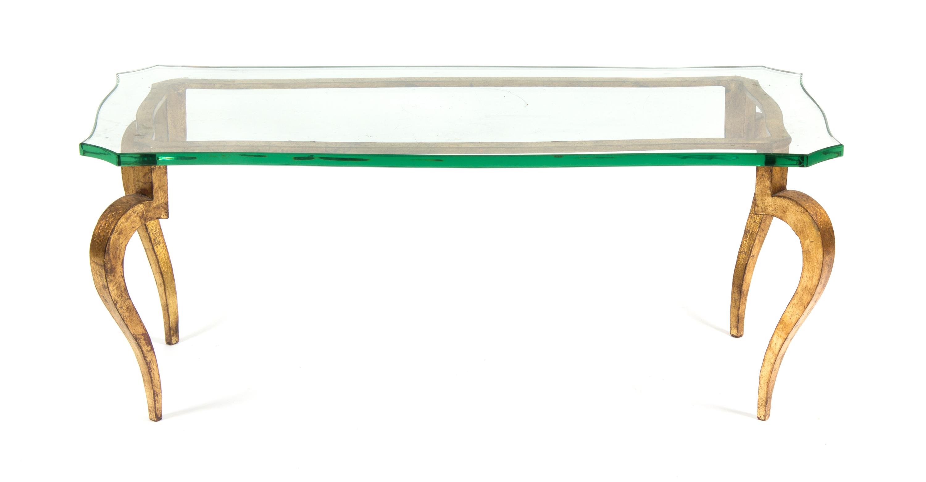 A Gilt Metal and Glass Low Table Height 17 x width 41 7/8 x depth 20 1/4 inches.
