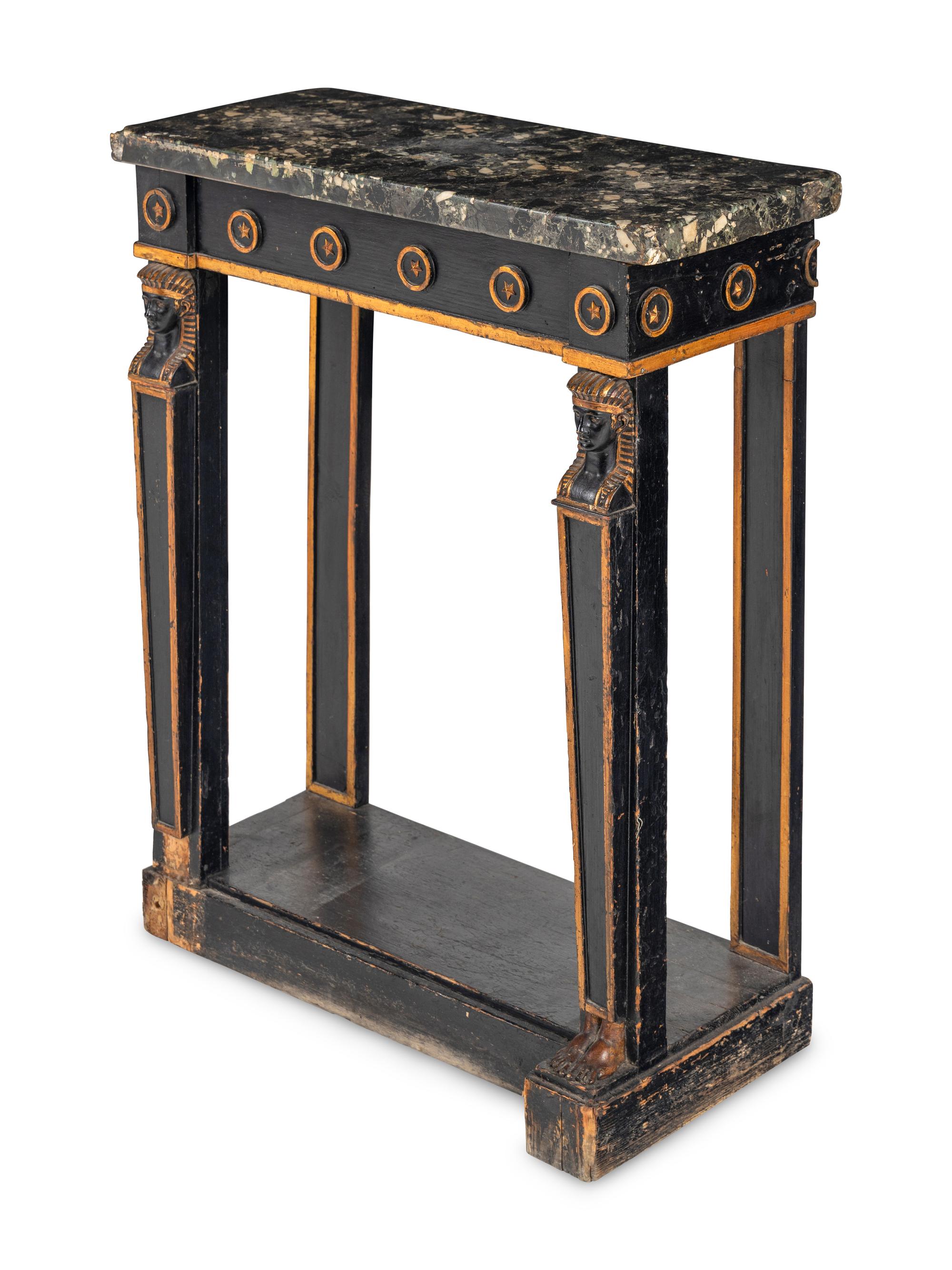 A Regency Style Parcel Gilt and Ebonized Pier Table