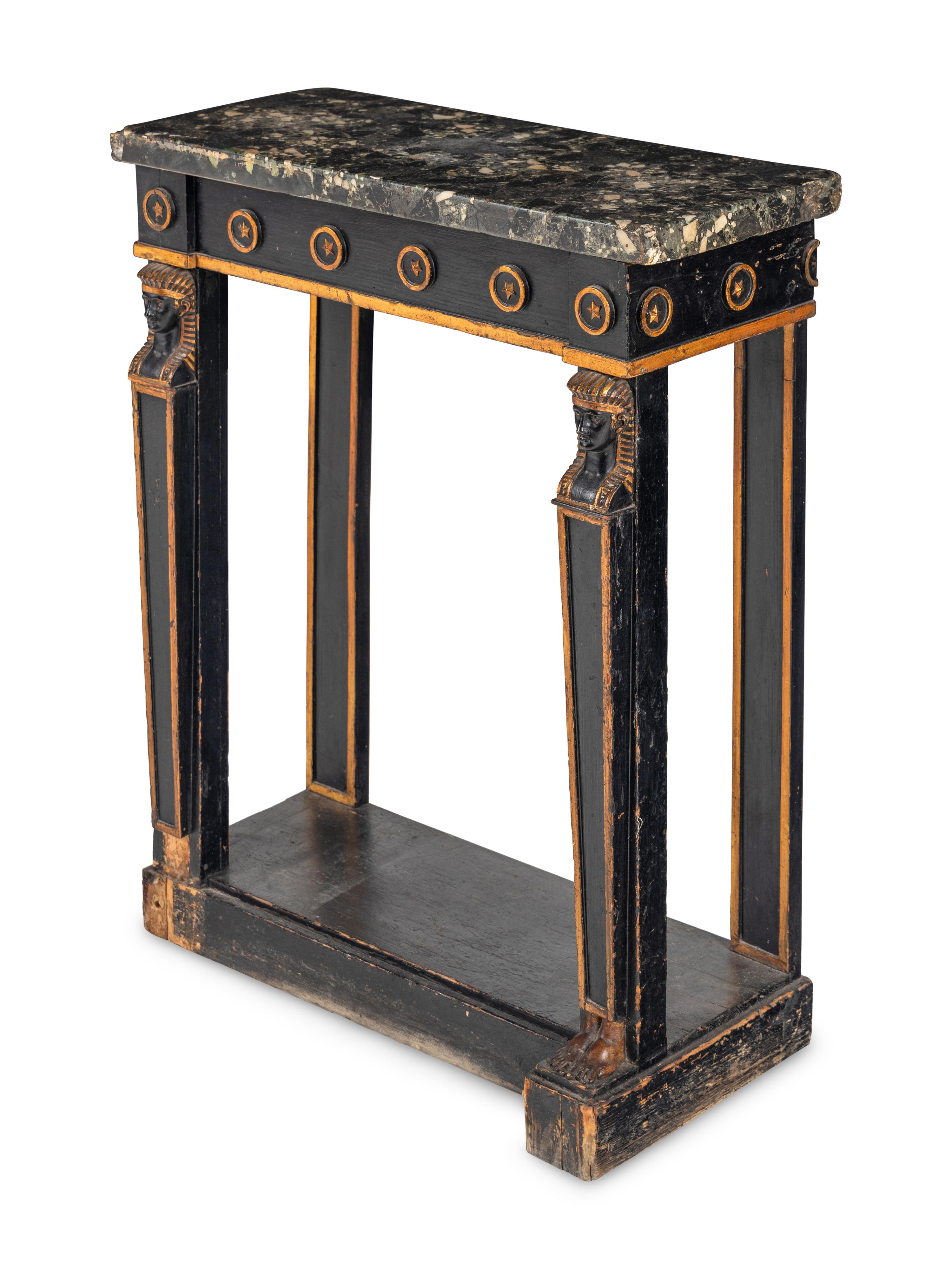 A Regency Style Parcel Gilt and Ebonized Pier Table