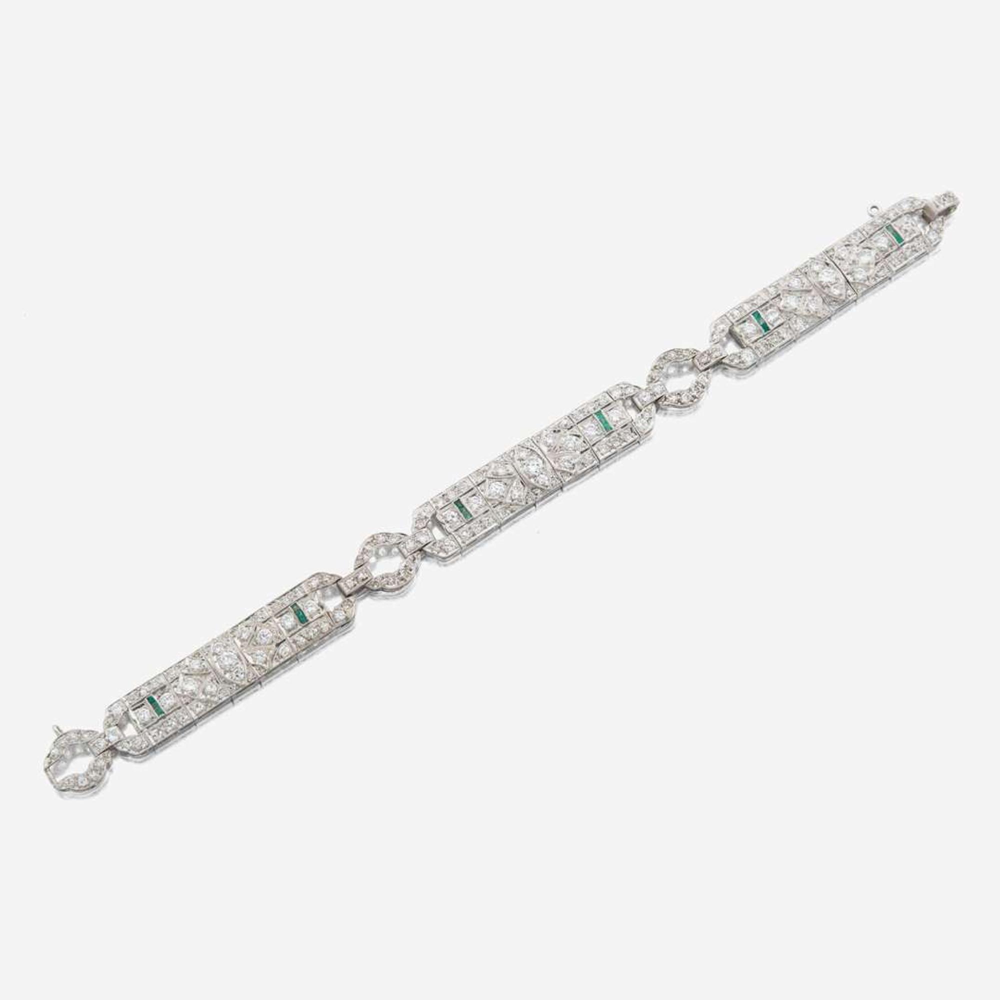 An Art Deco diamond, emerald, and platinum bracelet