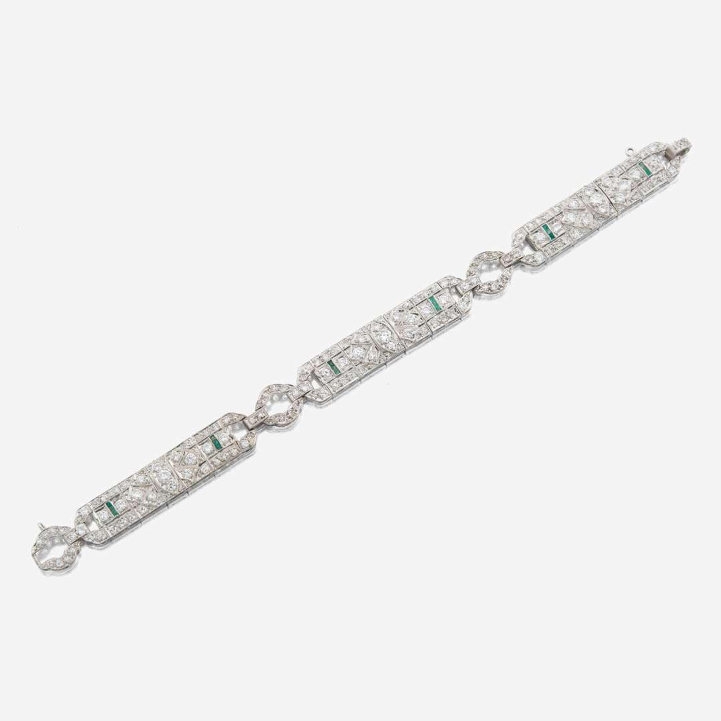 An Art Deco diamond, emerald, and platinum bracelet