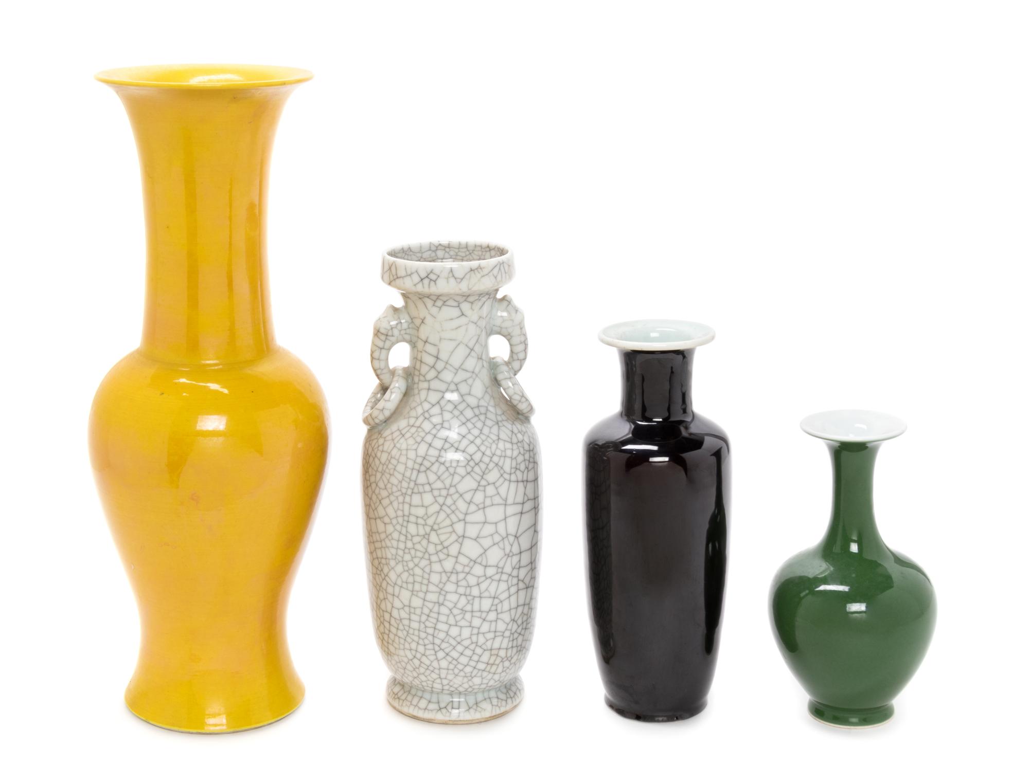 Four Chinese Monochrome Glazed Porcelain Vases Height of tallest 16 inches. — LATE 19TH-20TH CENTURY