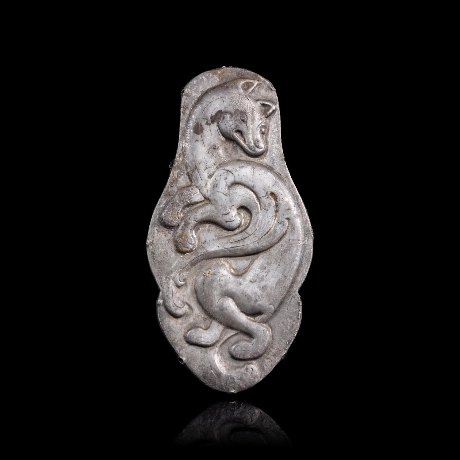 A Chinese Silver 'Winged Fox' Harness Ornament, Northeast China, Xianbei Tribe, Han-Jin Dynasty 汉-晉 鲜卑“飛狐”銀馬珂