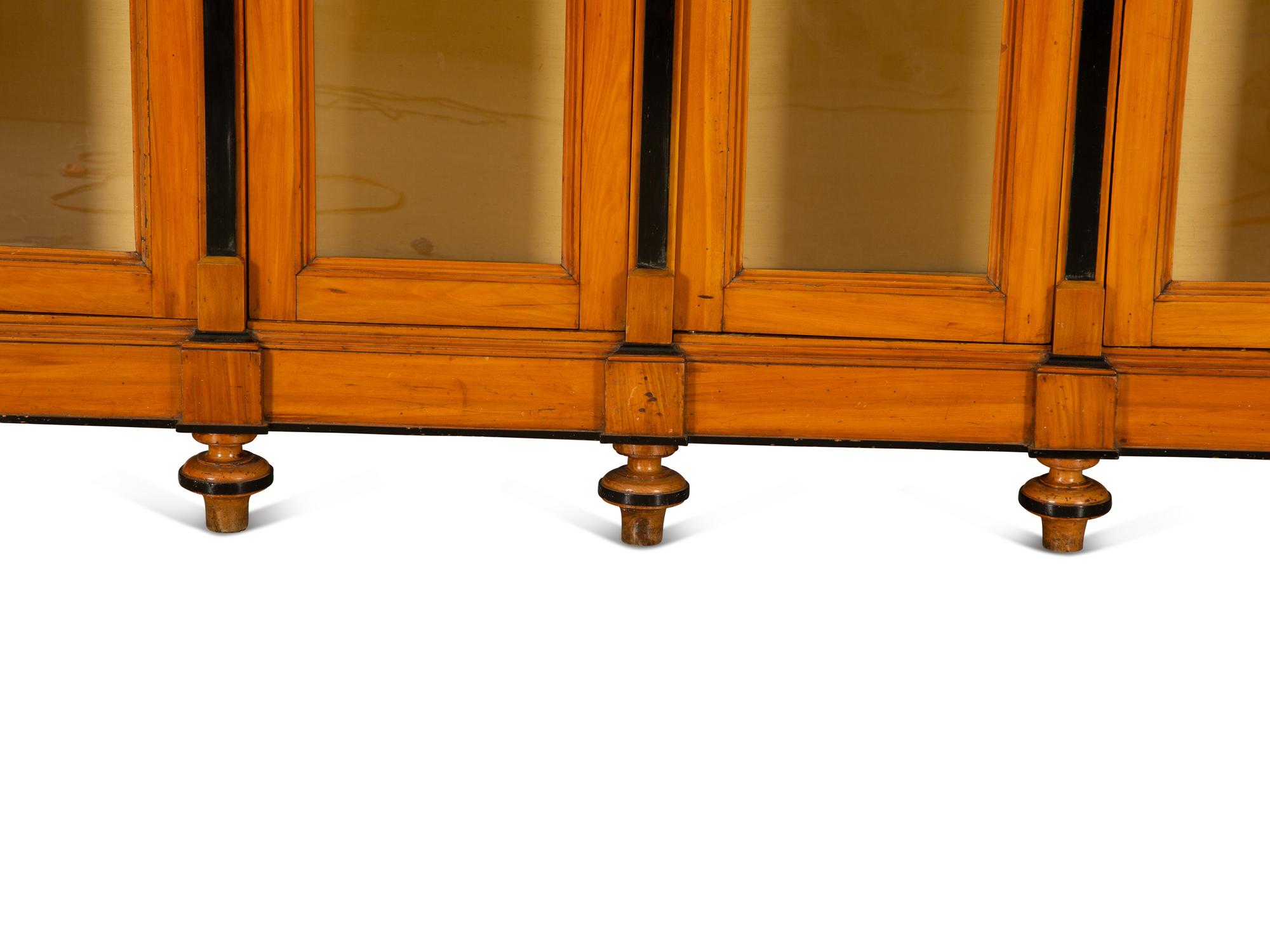 A Biedermeier Style Walnut Bookcase — 19th/20th Century