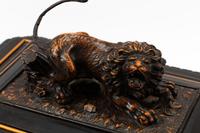 An Austrian Carved and Ebonized Wood Table Casket with a Lion