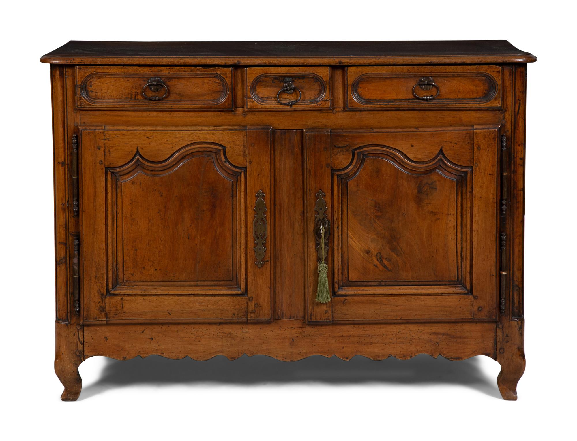 A Louis XV Provincial Walnut Serving Cabinet