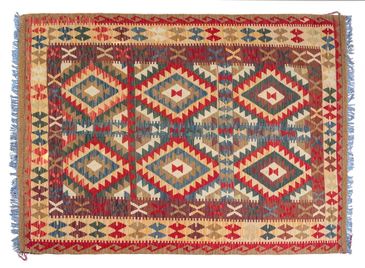 A Kilim Wool Rug 5 feet x 6 feet 6 inches.