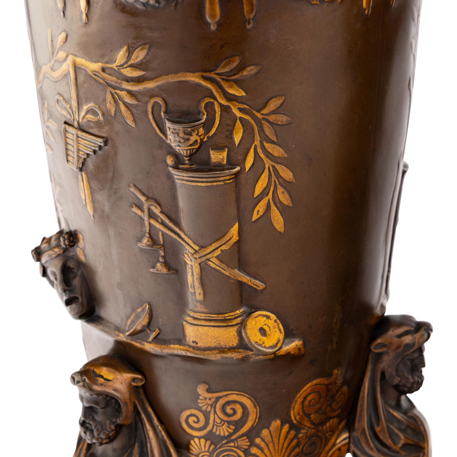 A Pair of Neoclassical Patinated and Parcel Gilt Bronze Vases