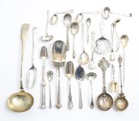 A Collection of Silver and Silver-Plate Serving Articles, various makers, comprising sugar scoops, jelly spoons, cheese scoops, nut sco