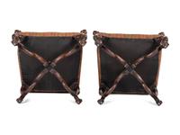 A Pair of Louis XV Style Carved Walnut Fauteuils