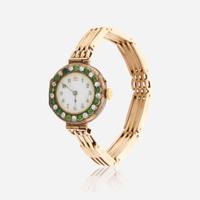 A gold, diamond, and green stone bracelet watch, Swiss C.1909