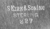 An American Silver Center Bowl, S. Kirk & Son Inc., Baltimore, MD, pattern 227, the rim having floral, foliate and S-scroll repousse de