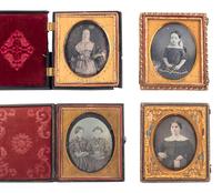 [EARLY PHOTOGRAPHY]. 12 daguerreotype portraits of female subjects holding cased images, including:
