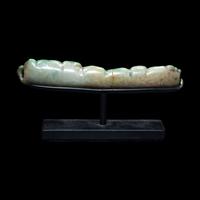 A Maya Jade Serpent Pendant
