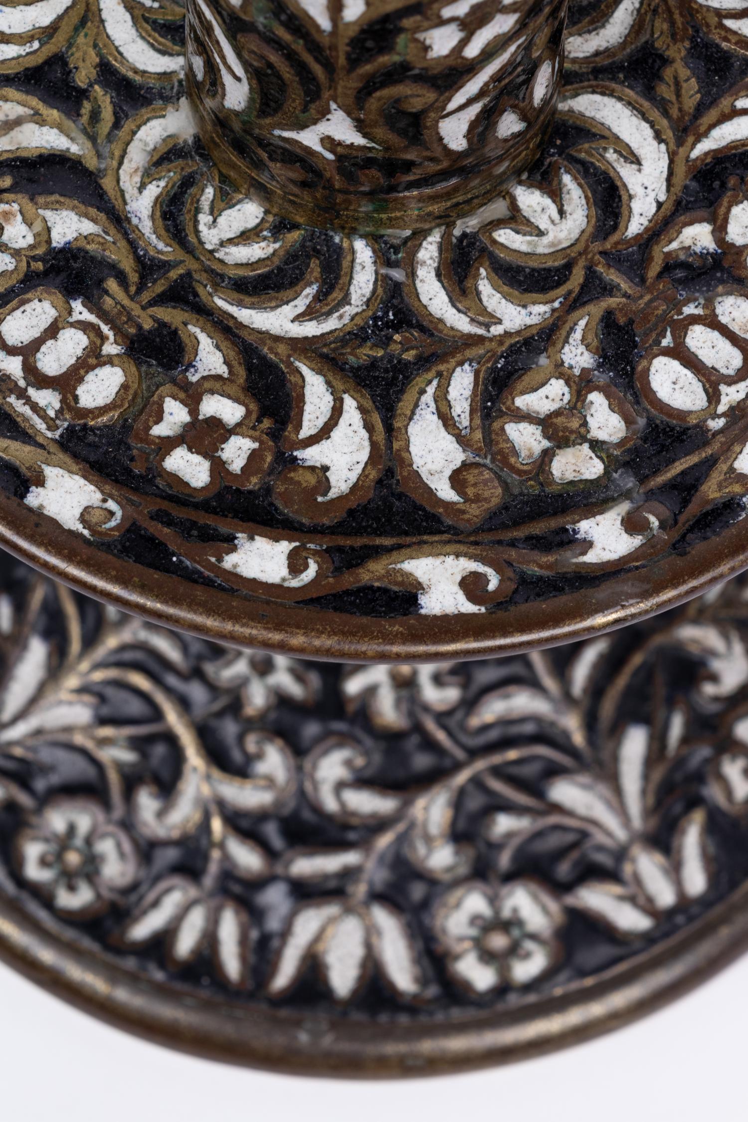 A Pair of Cast Brass 'Surrey Enamel' Candlesticks