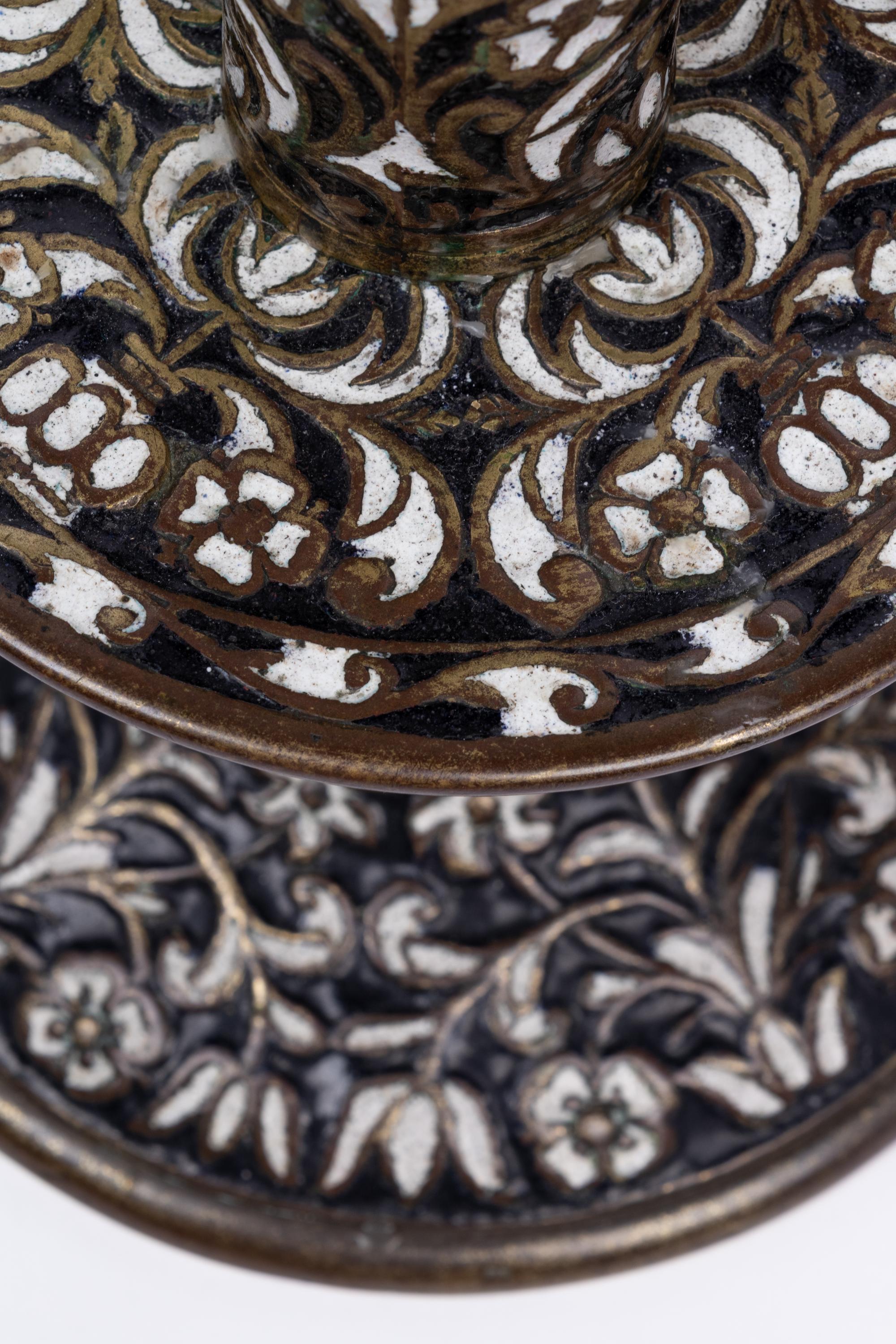 A Pair of Cast Brass 'Surrey Enamel' Candlesticks