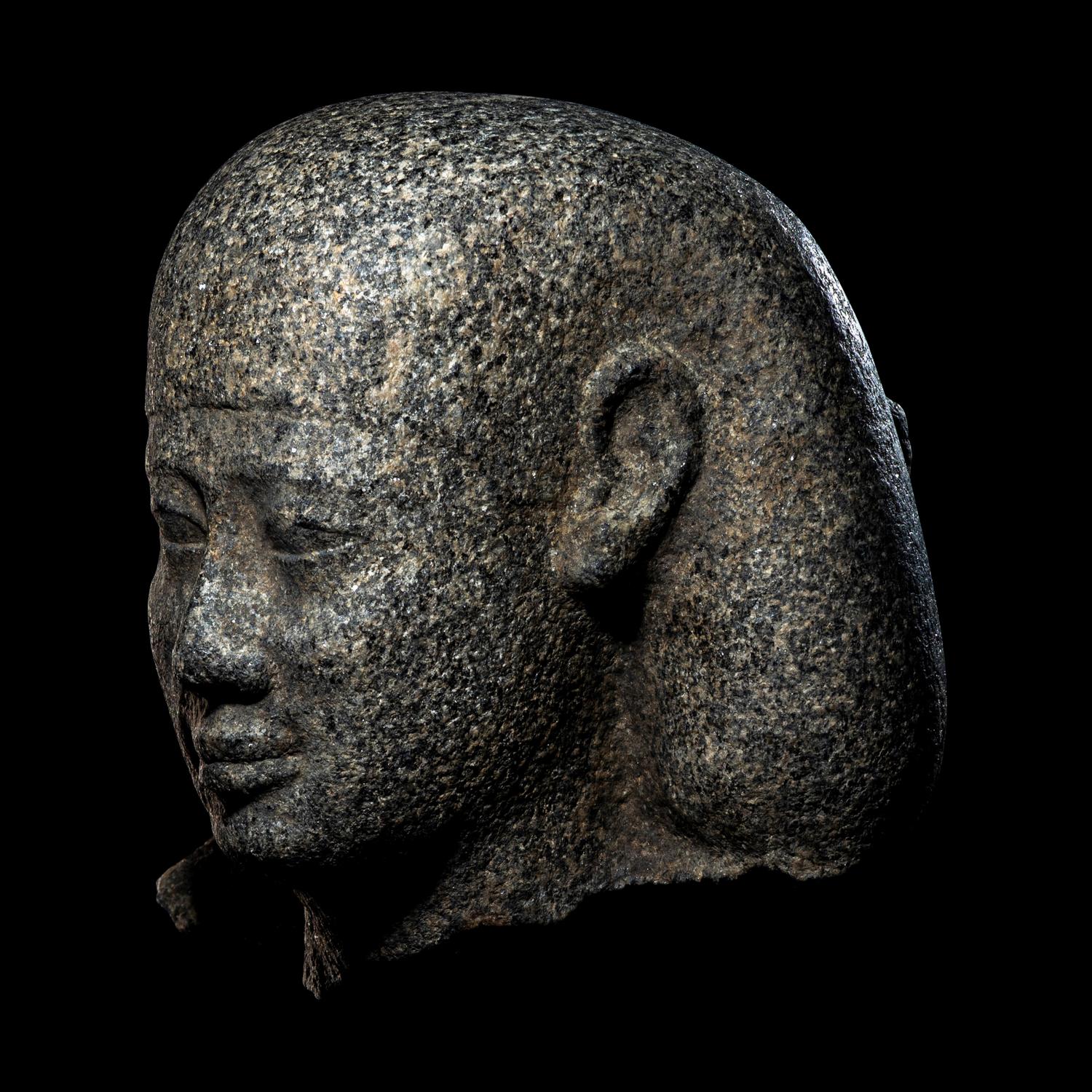 An Egyptian Granite Head of a Man