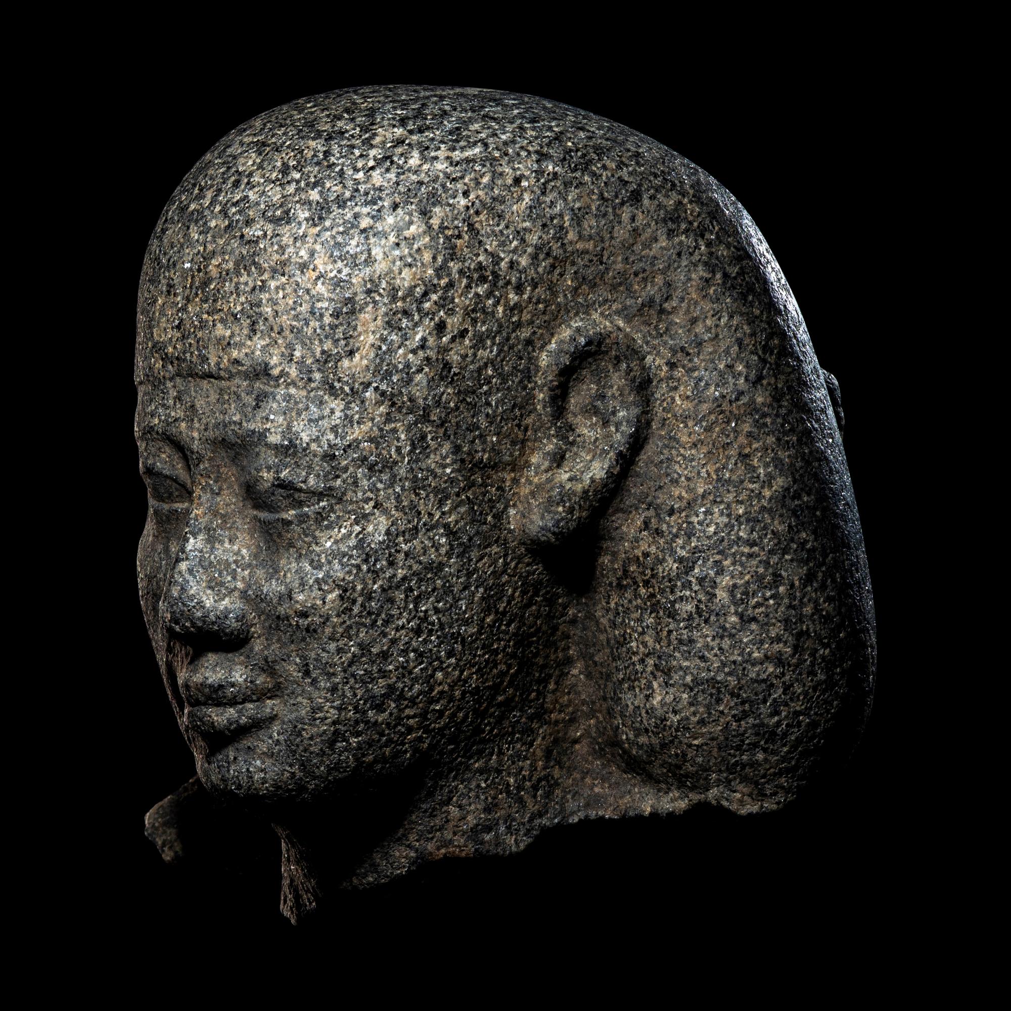 An Egyptian Granite Head of a Man