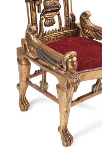 A Pair of Egyptian Style Painted and Parcel-Gilt Armchairs