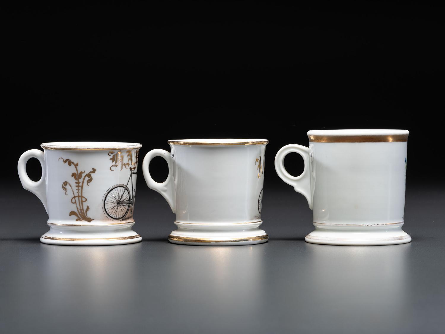 Three Cyclist's Porcelain Shaving Mugs