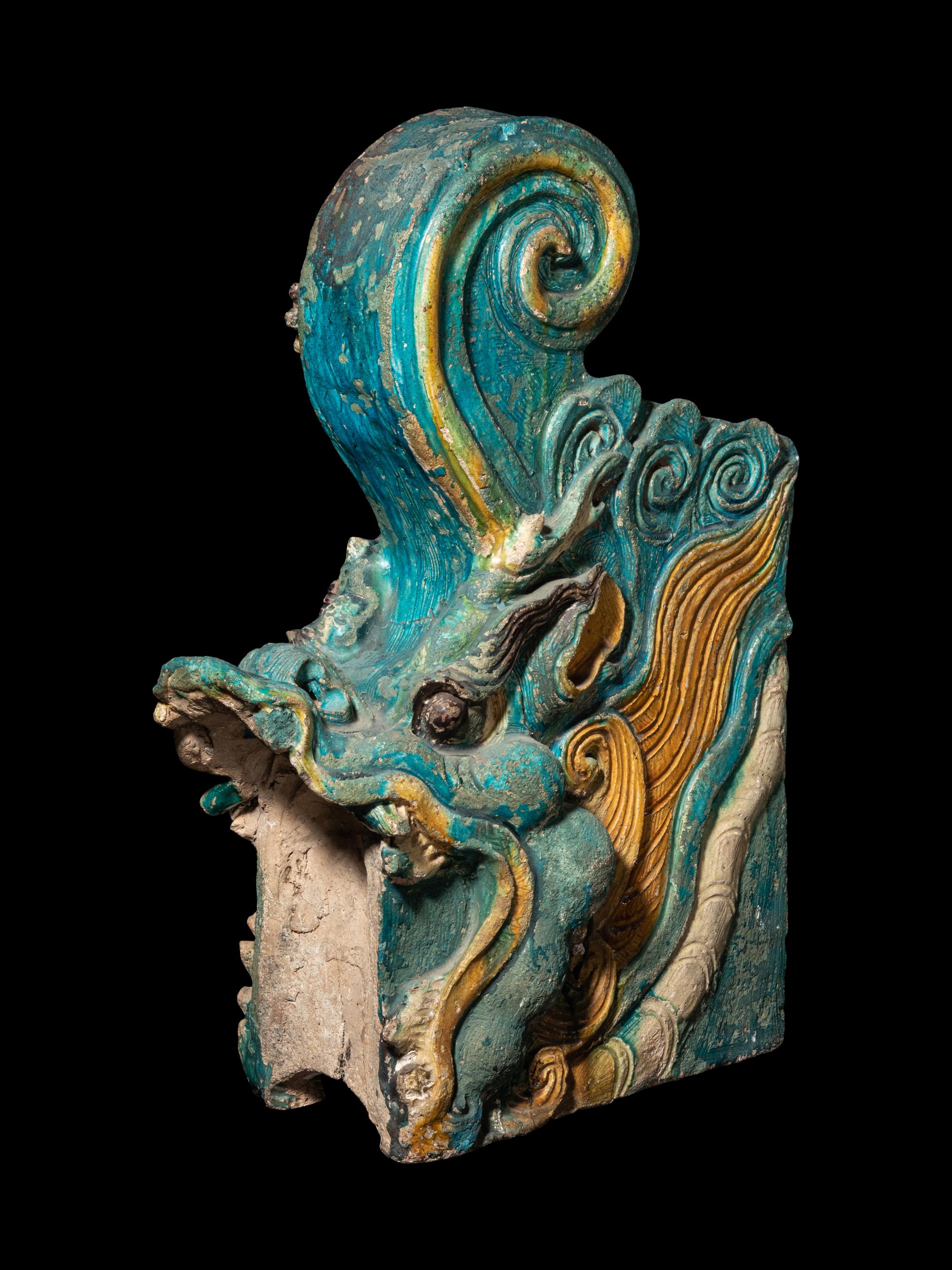 A Turquoise Glazed Pottery 'Dragon' Roof Tile