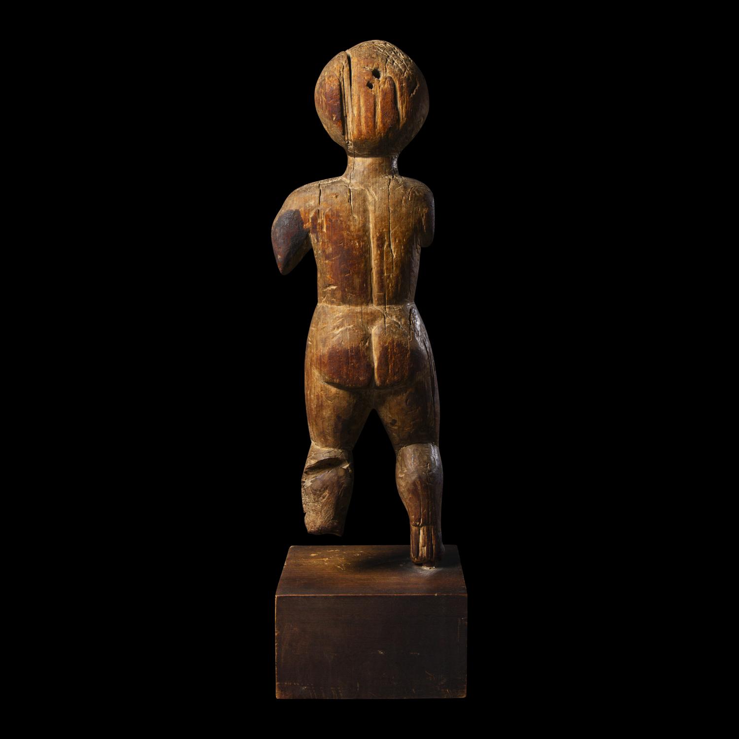 A Santo Niño Wood Figure