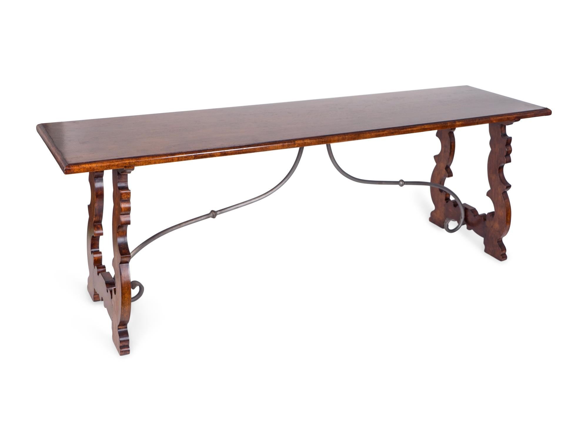 An Italian Baroque Style Mahogany Trestle Table
