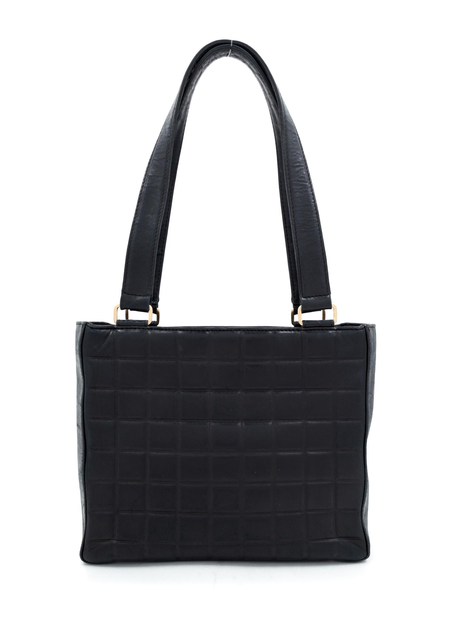 A Chanel Black Lambskin "Chocolate Bar" Tote, 8" H x 10" W x 3.25" D; Strap drop: 9".