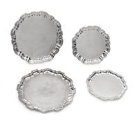 A Group of Four English Silver Waiters