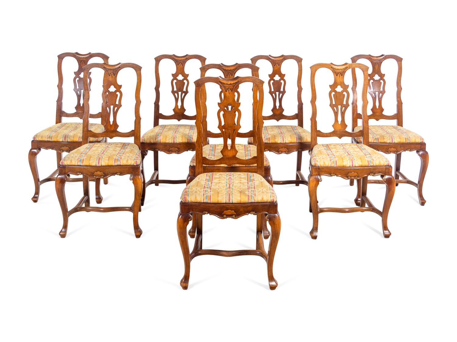 A Set of Eight French Walnut Dining Chairs