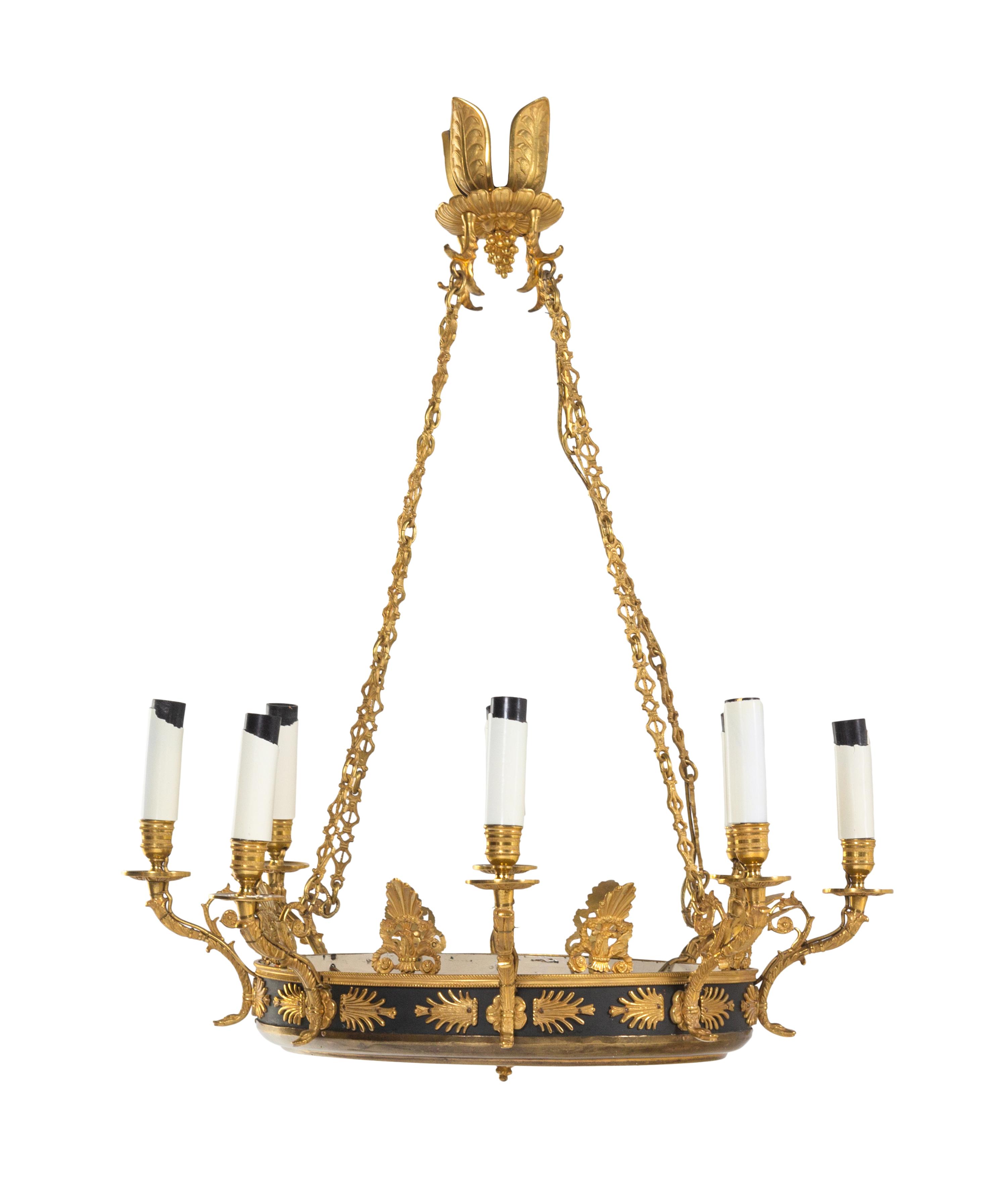 An Empire Style Gilt Bronze and Green Tôle Eight-Light Chandelier