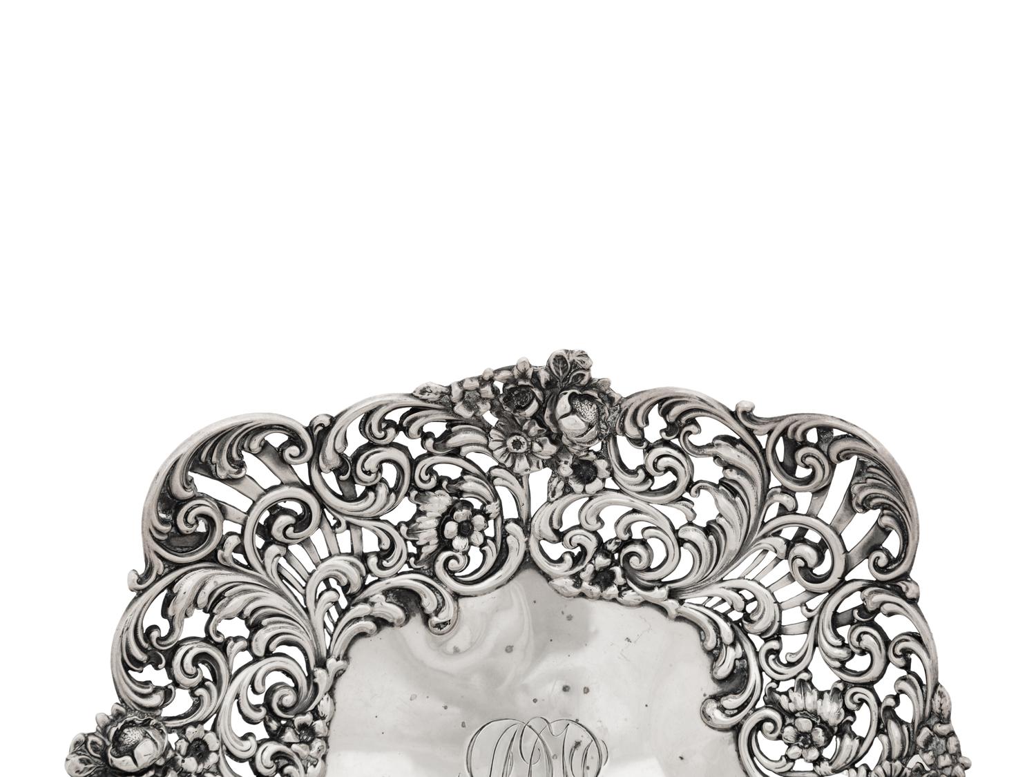 An American Silver Reticulated Bowl Raised on Ball Feet