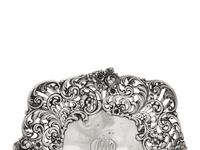An American Silver Reticulated Bowl Raised on Ball Feet