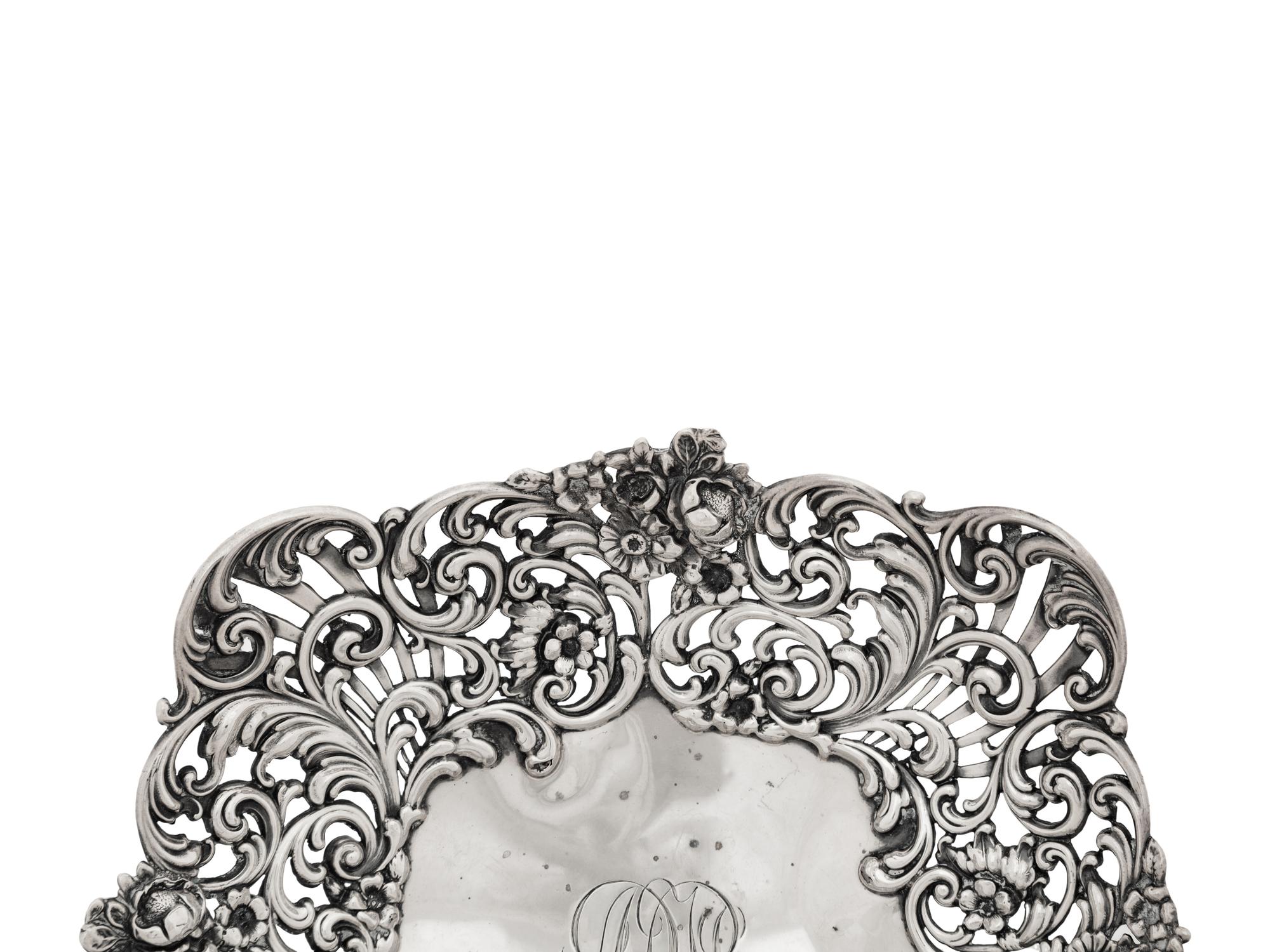 An American Silver Reticulated Bowl Raised on Ball Feet