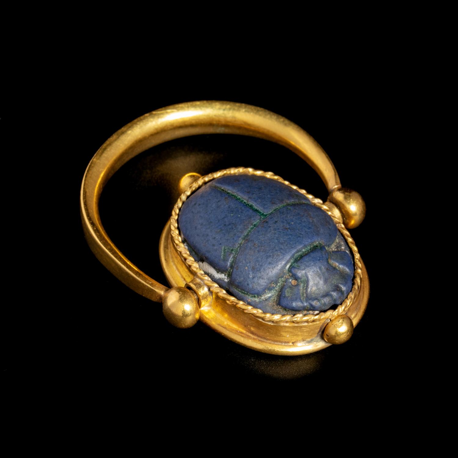 An Egyptian Faience Scarab Swivel Ring