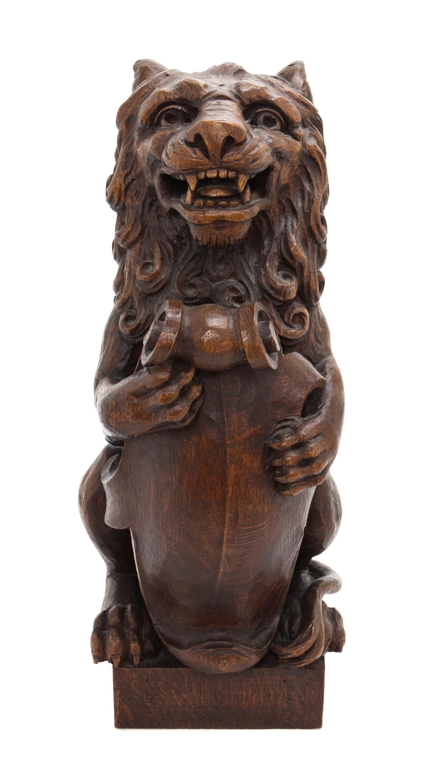 A Carved Walnut Newel Post Figure, Height 15 1/2 inches.