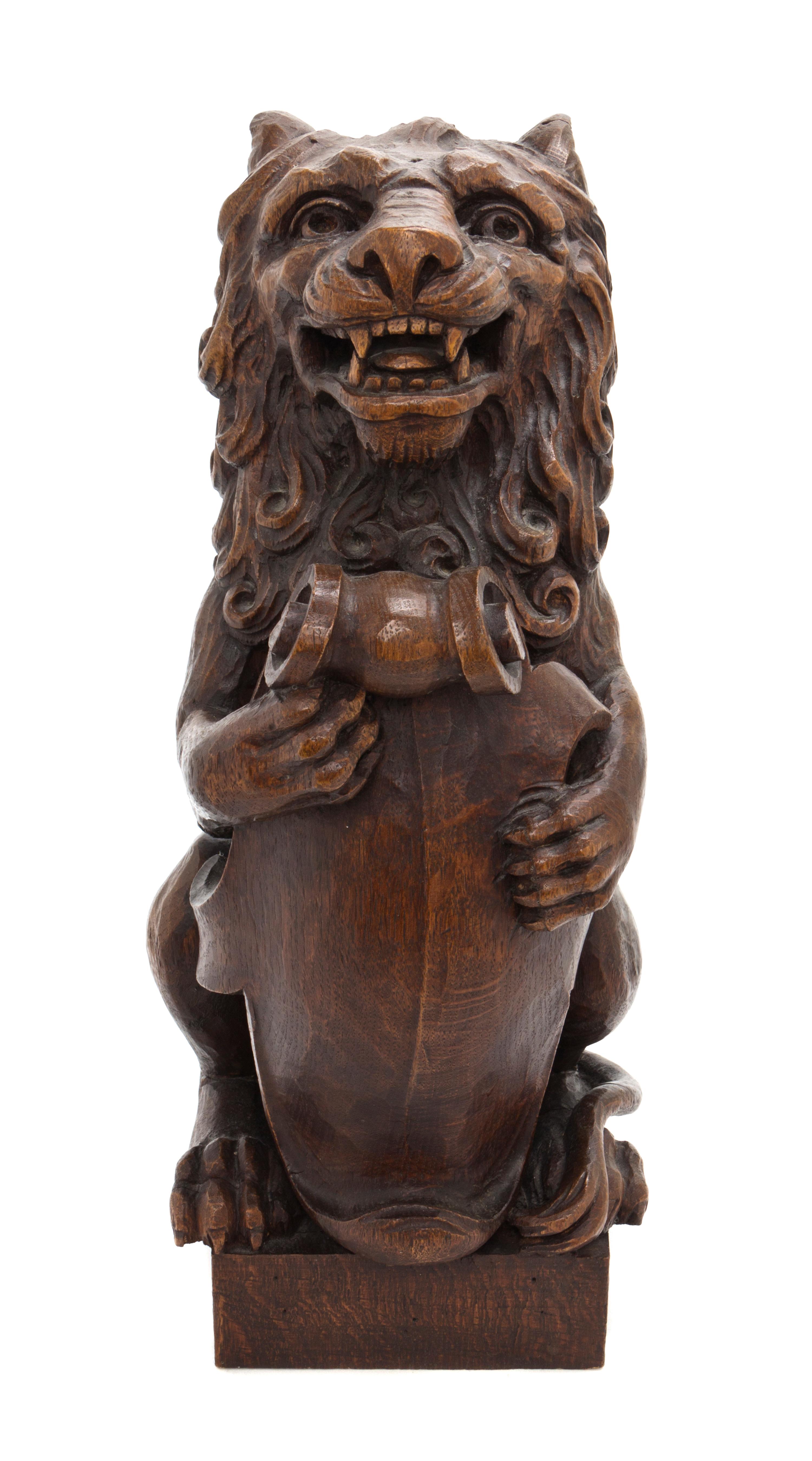 A Carved Walnut Newel Post Figure, Height 15 1/2 inches.