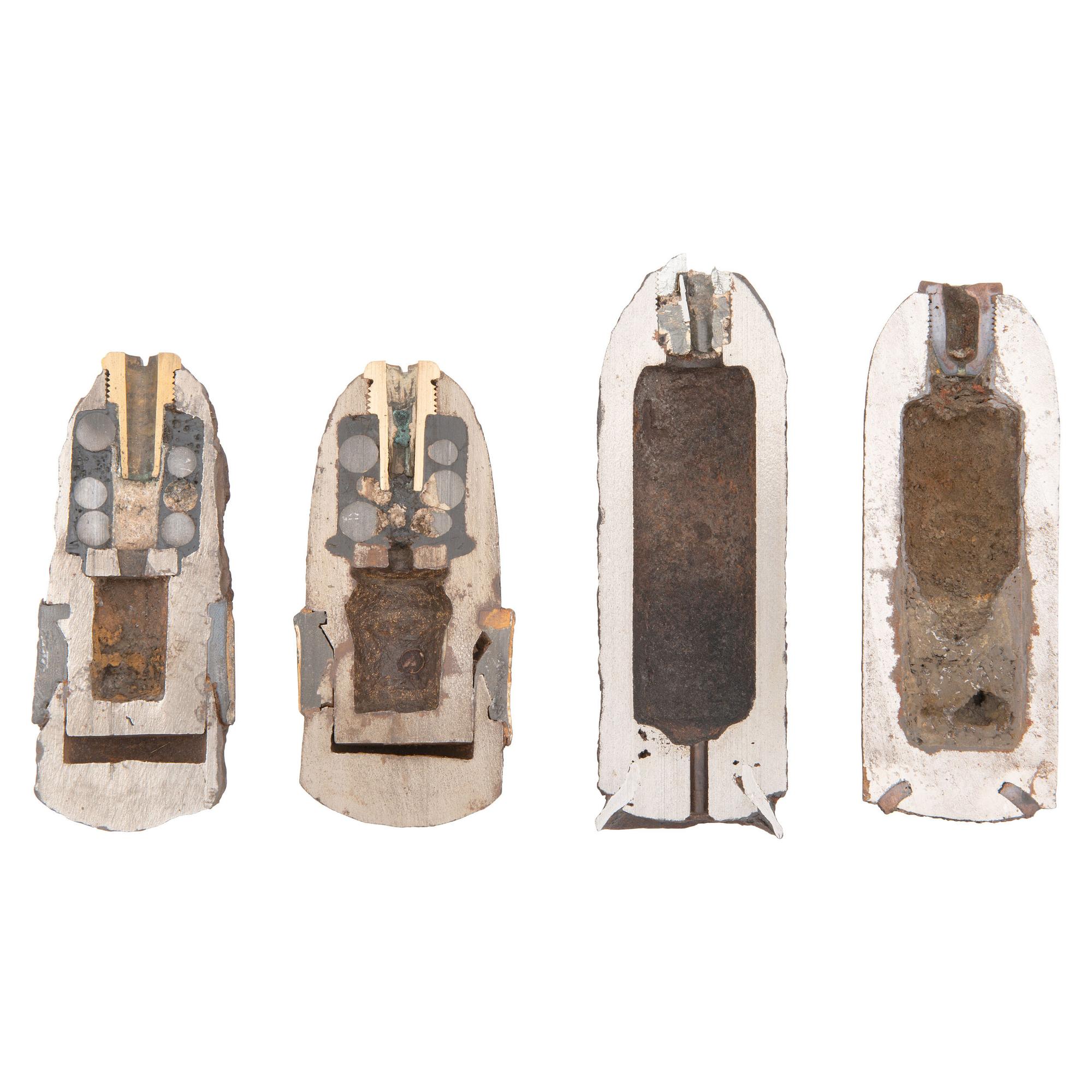 Four Excavated Civil War Era Sectioned Half Artillery Shells, including Hotckiss and Parrott