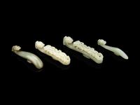 Four Chinese Carved Celadon Jade Belt Hooks