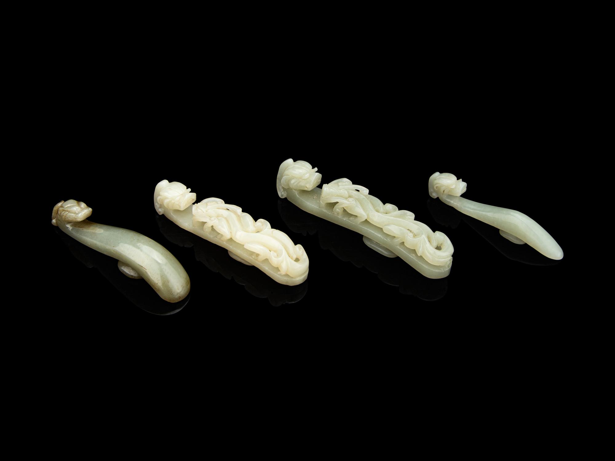Four Chinese Carved Celadon Jade Belt Hooks