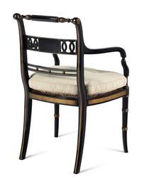 A Set of Four Regency Style Painted and Parcel Gilt Armchairs
