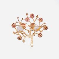 An 18K Yellow Gold, Pearl, and Ruby Brooch