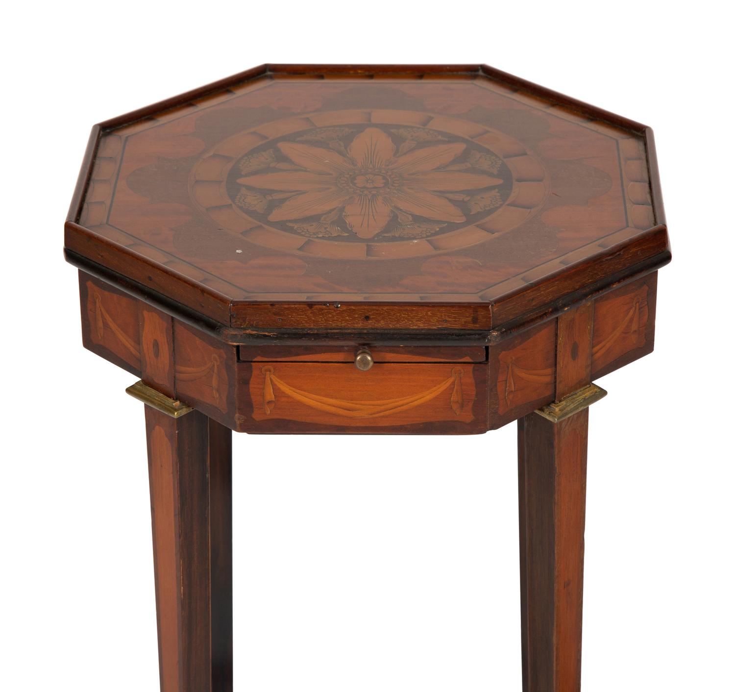 A Pair of George III Style Mahogany Candle Stands