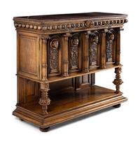 A Renaissance Revival Carved Walnut Marble-Top Cabinet