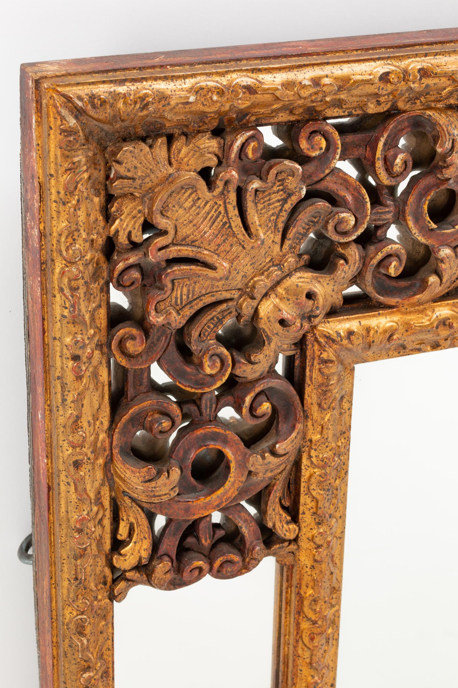 A Spanish Baroque Style Giltwood Mirror