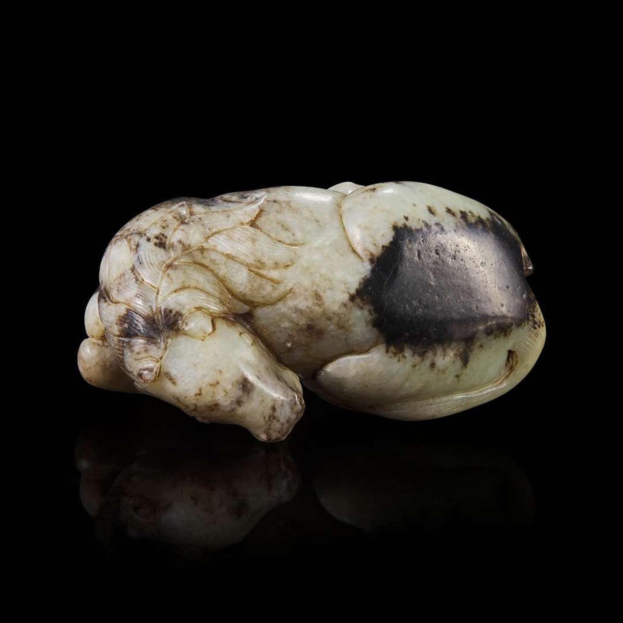 A Chinese jade carving of a recumbent horse 玉雕卧马 Ming dynasty-early Qing dynasty ????