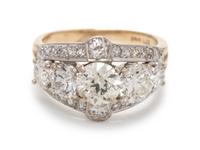A 14 Karat Bicolor Gold and Diamond Ring,