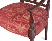 A Set of Four Federal Carved Mahogany Chairs